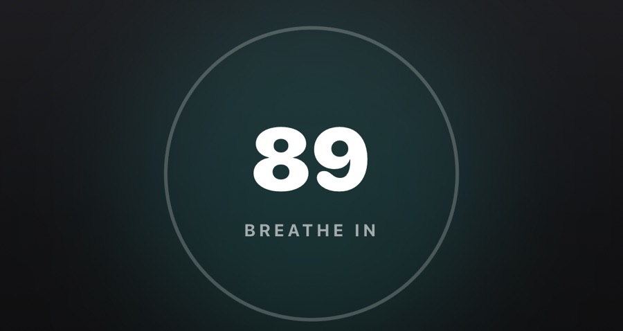 The breathing pause counting down inside a teal ring